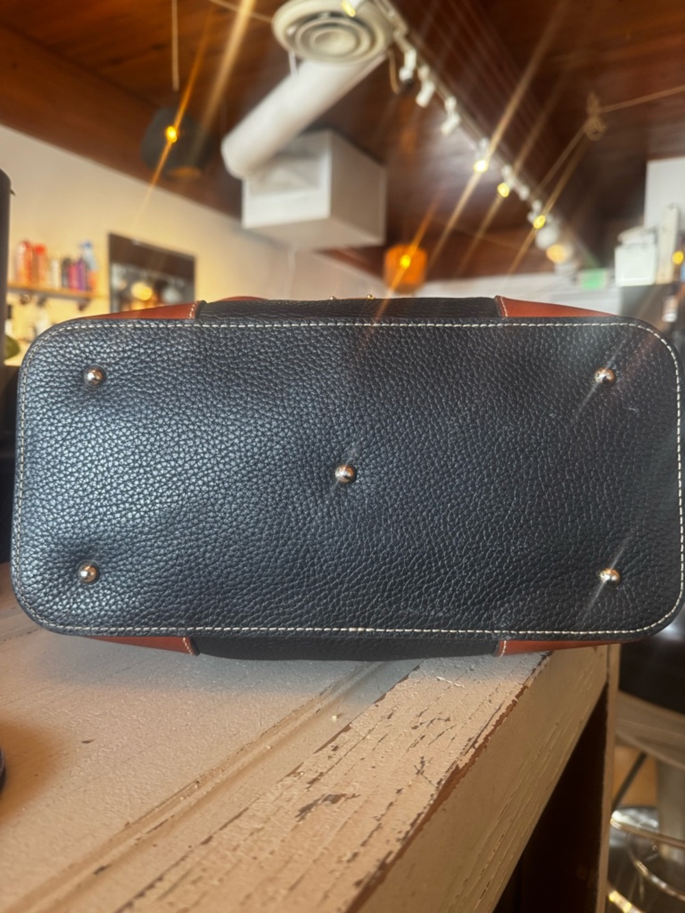 Dooney & Bourke Black Leather Tote with Brown Trim and Handles - Picture 6 of 10